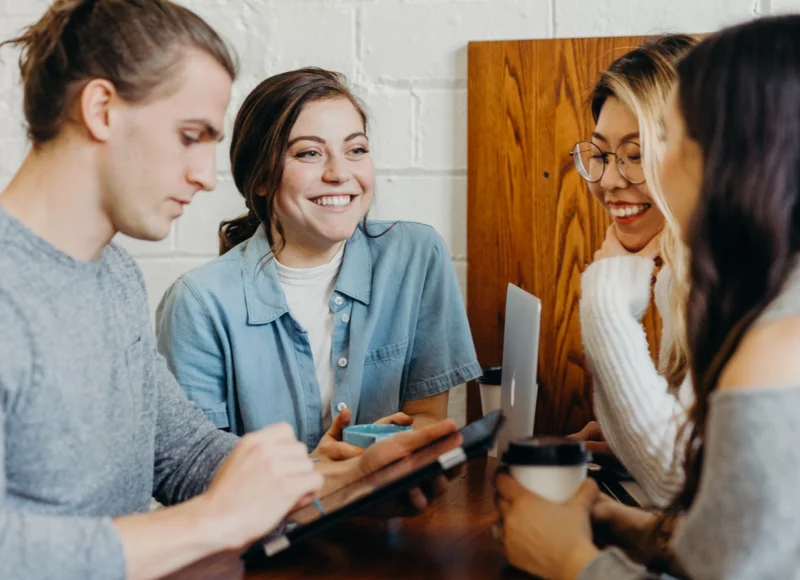 A small group of adults talking together